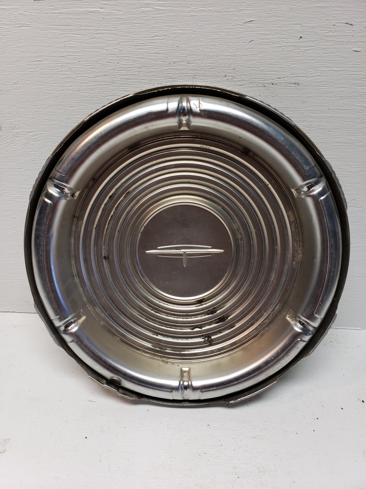 1964 Oldsmobile Cutlass Hubcap 14in